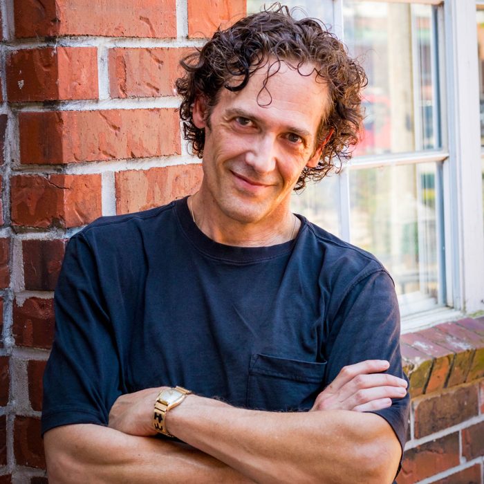 Dr. Kevin J. Payne, square headshot against a brick wall